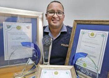 Young police officer makes a difference in his community