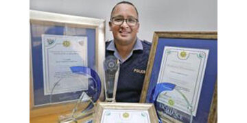 Young police officer makes a difference in his community